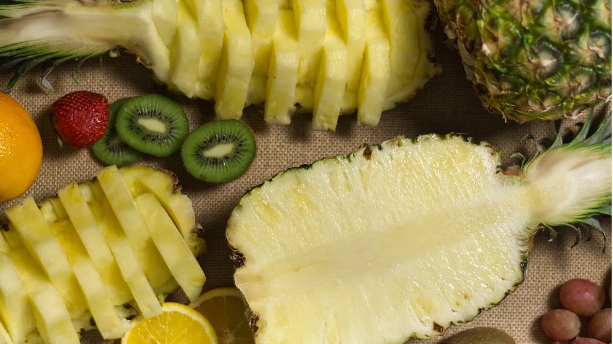 Fresh pineapple with other fruit.