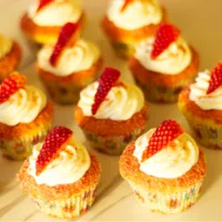 Strawberry Crunch Cupcakes arranged in rows.