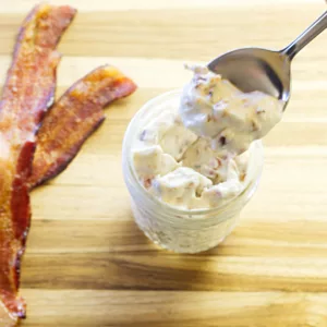 Spoonful of Baconnaise removed from a jar to show texture.