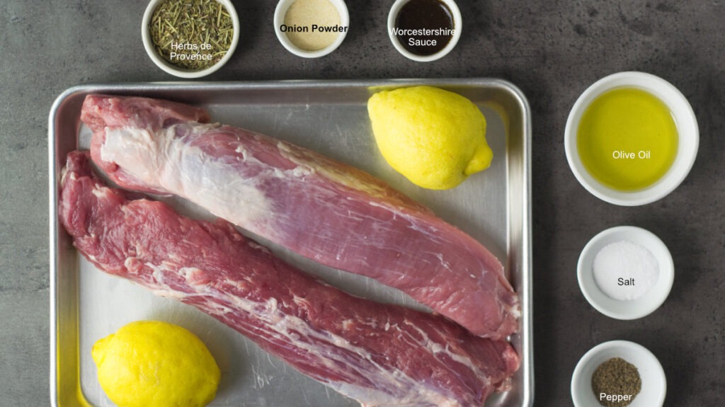 Ingredients used to make pellet grilled Pork Tenderloin- pork tenderloin, herbs de Provence, onion powder, Worcestershire sauce, olive oil, salt, pepper and lemon juice.