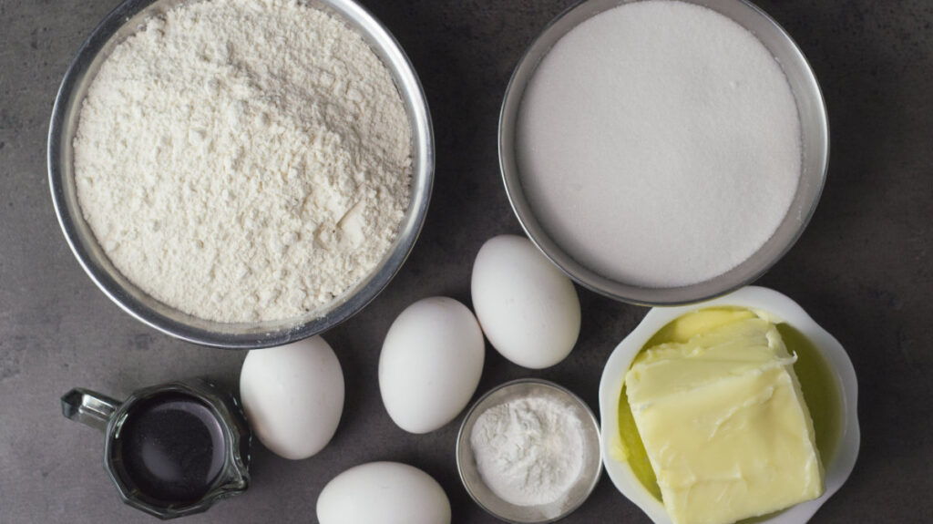 Ingredients needed to make Coffee Walnut Sandwich - flour, sugar, eggs, butter, baking powder, and espresso.