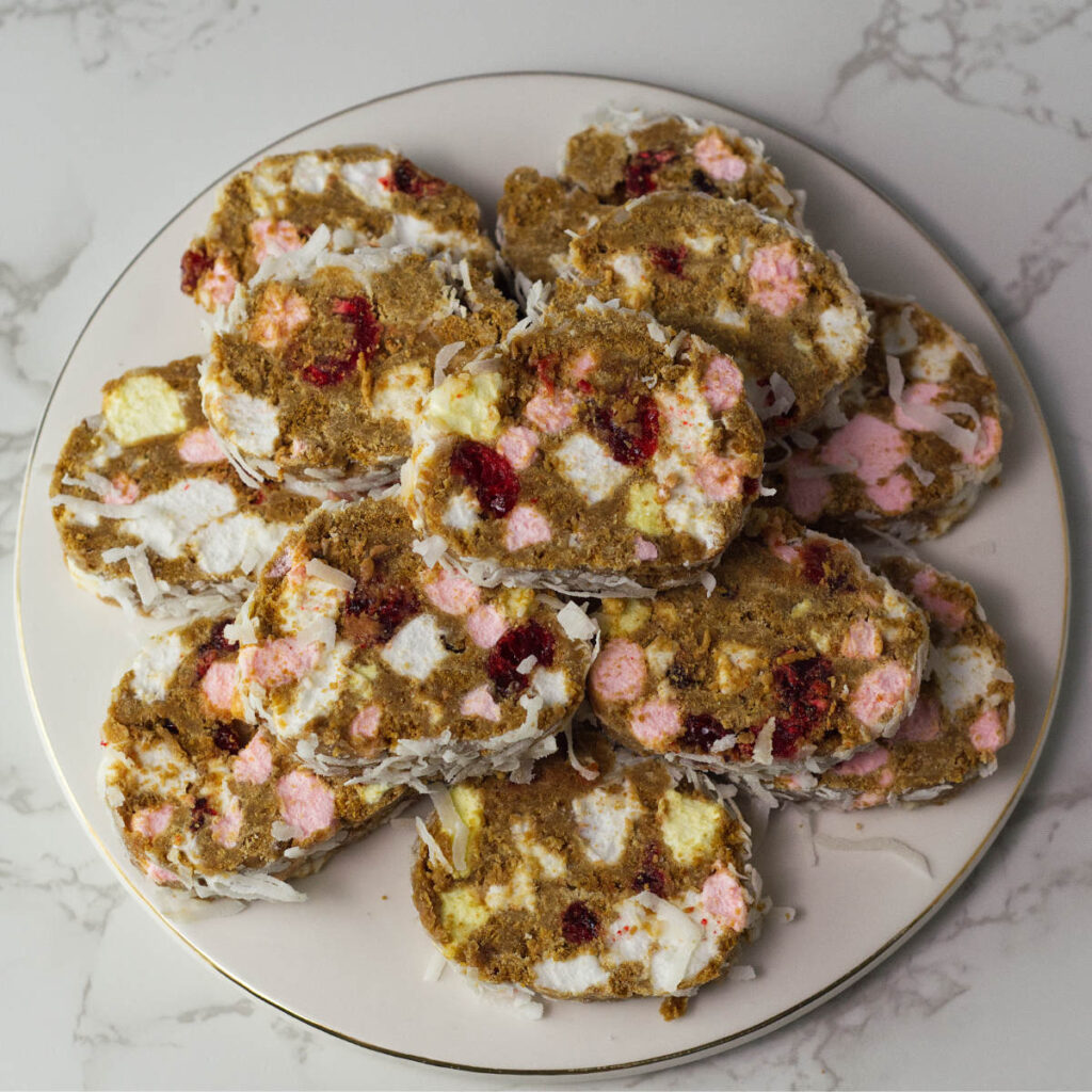 White round plate with slices of Fifteens on it.